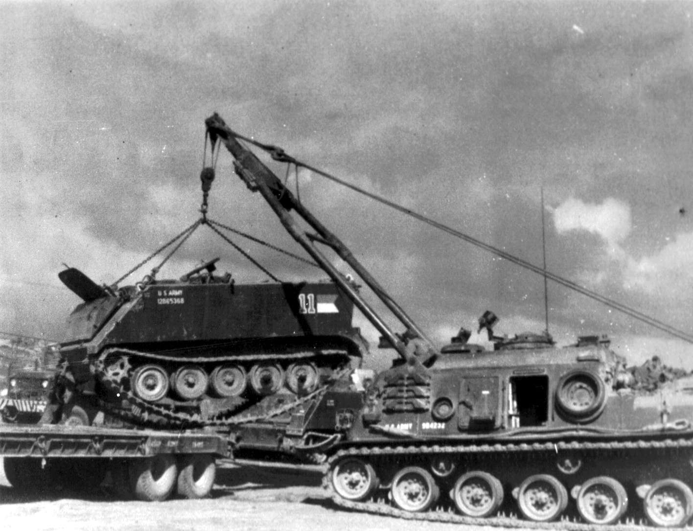 M88 lifting an APC.