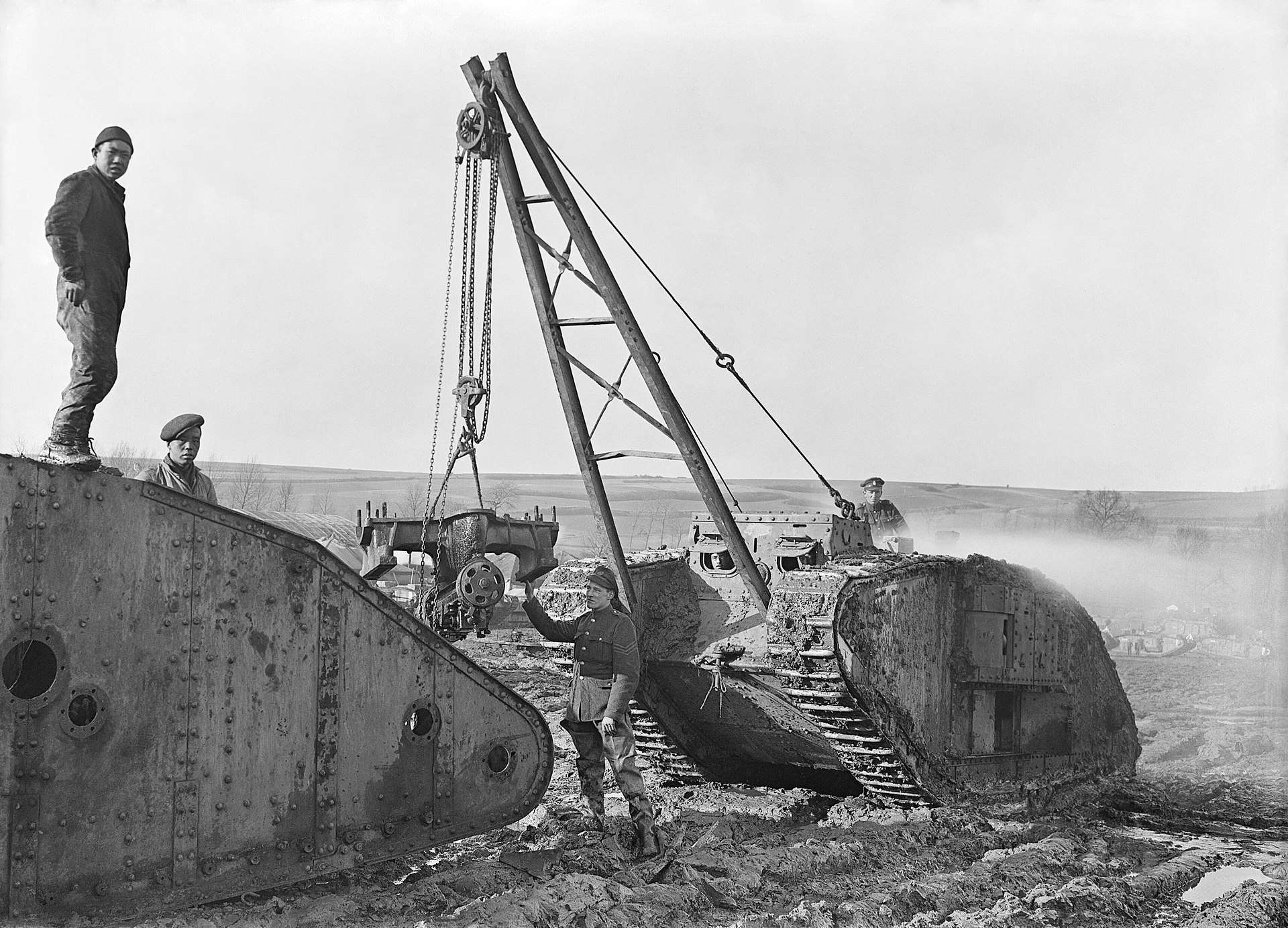 A Mark IV salvage vehicle removing components off another Mark IV tank.