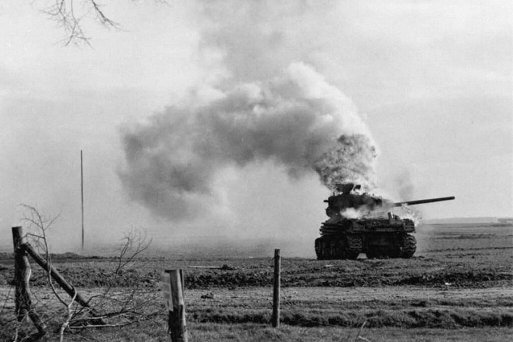 Sherman tank on fire.