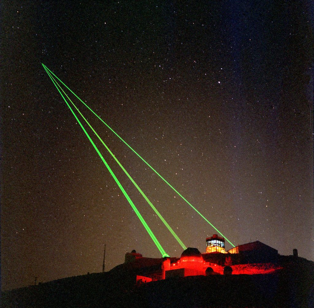 Lasers firing into space.
